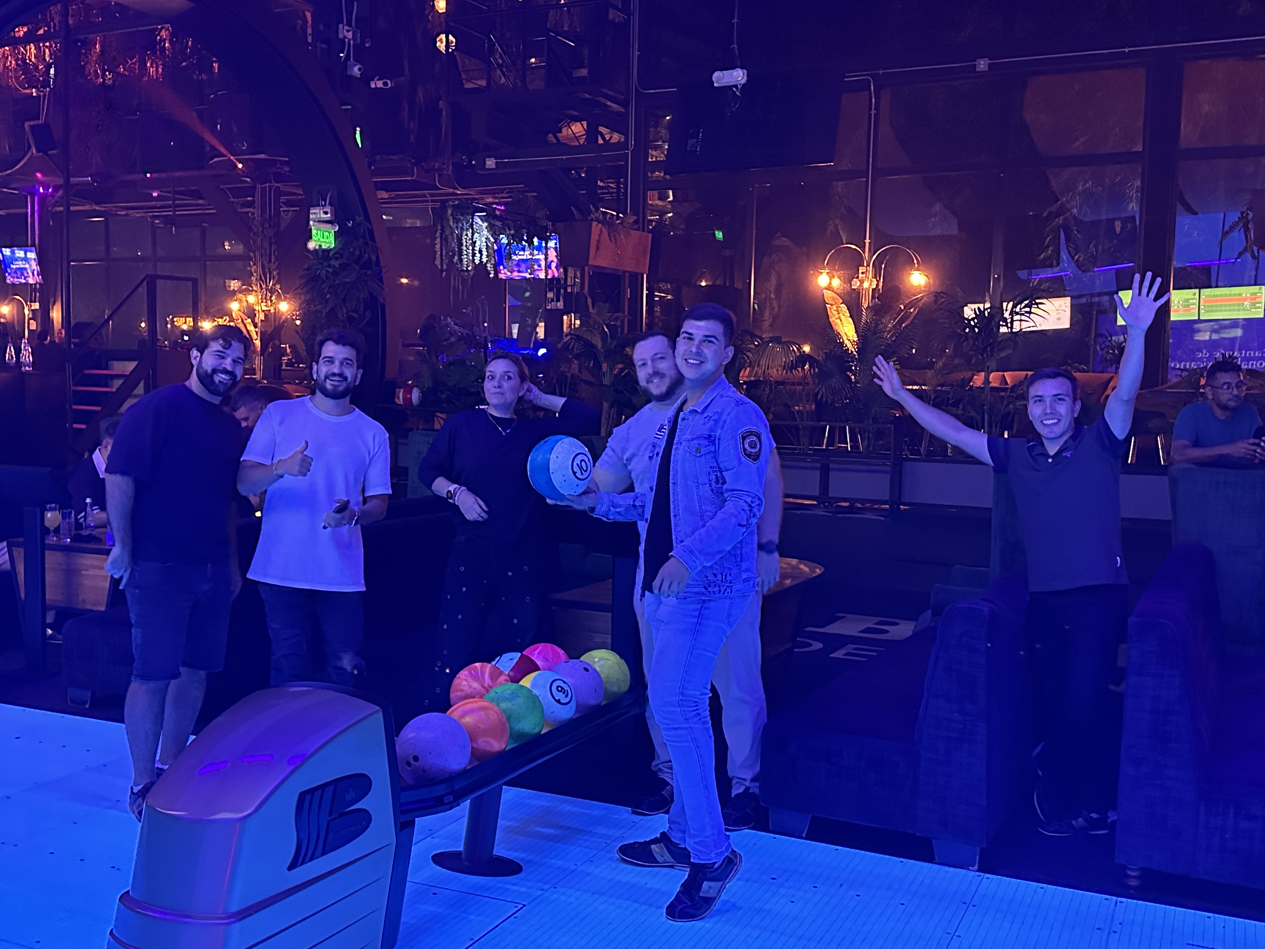 Team celebrating with bowling at Medellín